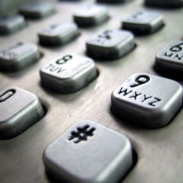 Telstra makes public pay phones free to use