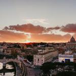 city with high rise buildings during sunset