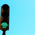 a traffic light with a green light on it