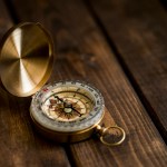 shallow focus photo of compass