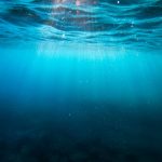 clear blue body of water