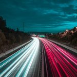time lapse photography of cars on road during night time
